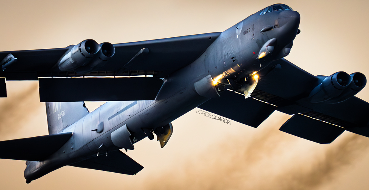 USAF B-52 bomber taking off at sunrise from Sevilla