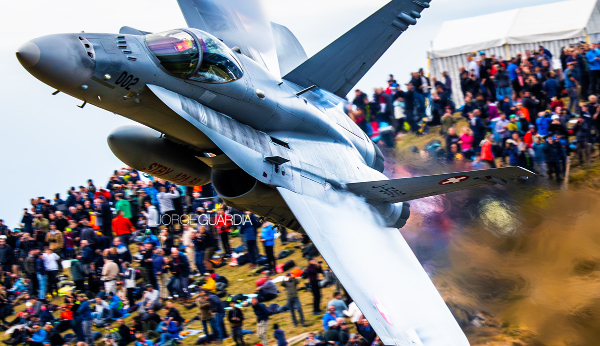 F-18 fighter jet of the Swiss Air Force performing a fast low pass during AXALP 2023