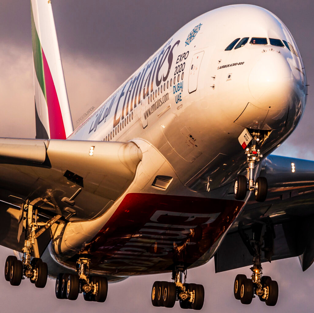 Emirates Airbus A380 landing during sunset at London Heathrow Airport