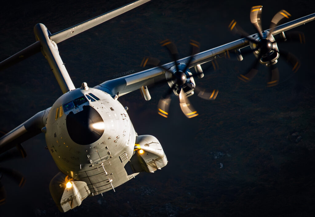 Airbus A400M of the Royal Air Force flying low through the Mach Loop in Wales