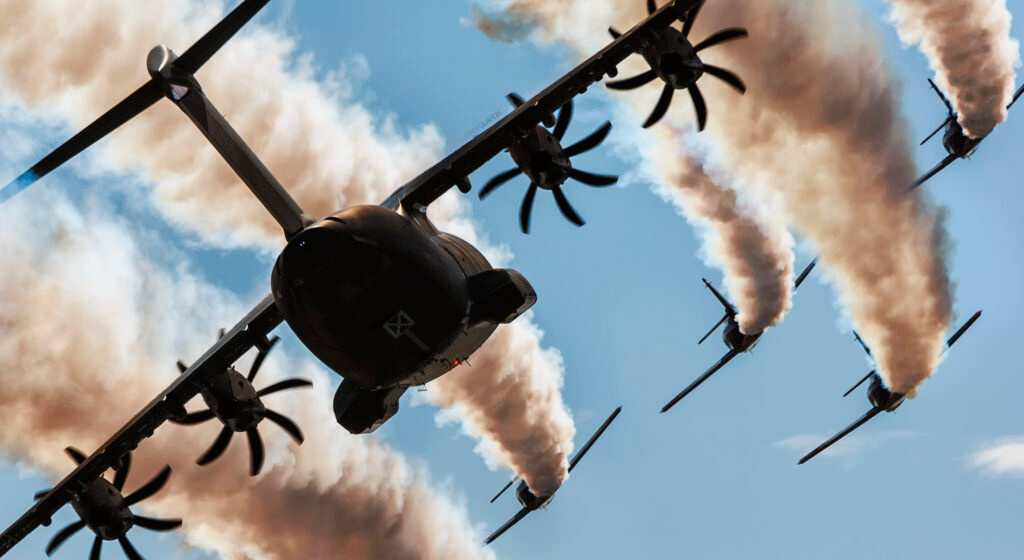 Airbus A400M from Airbus Flight Test flying in formation with Patrulla Aguila over Murcia