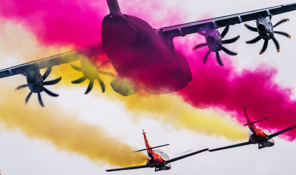 Spanish Air Force Airbus A400M flying in formation with Patrulla Aguila at Gijon Airshow