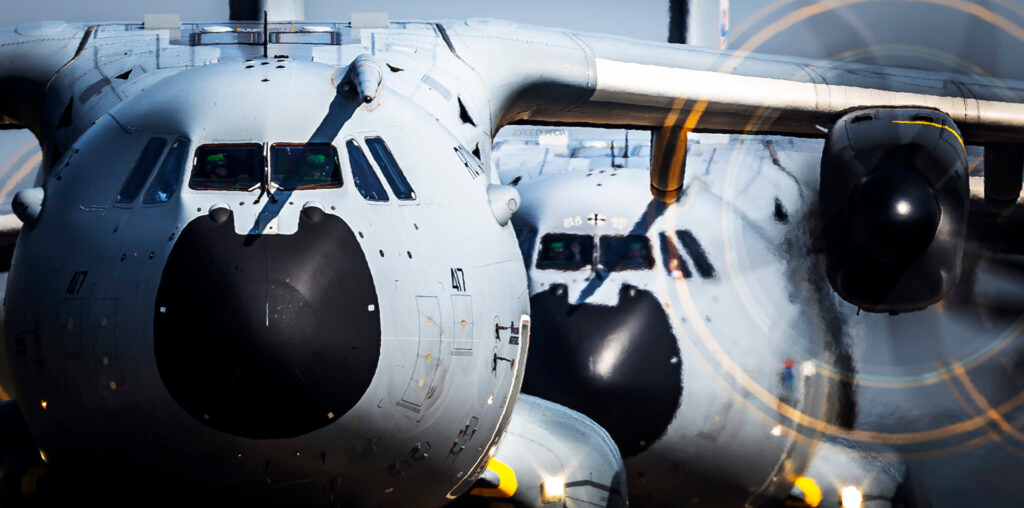 Two Airbus A400M from the Luftwaffe and the Royal Air Force taxiing in formation at Eindhoven