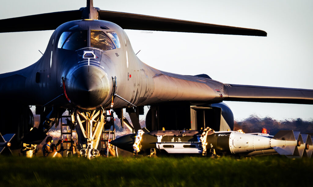 Rockwell B-1 Lancer at ground getting loaded with GBU-31 JDAM bombs at Fairford
