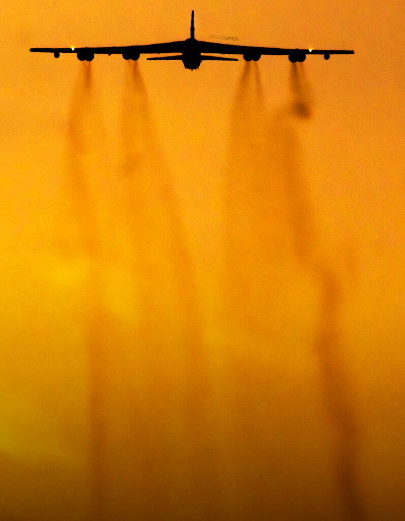 Boeing B-52 Stratofortress flying over Sevilla on sunset during a Bomber Task Force