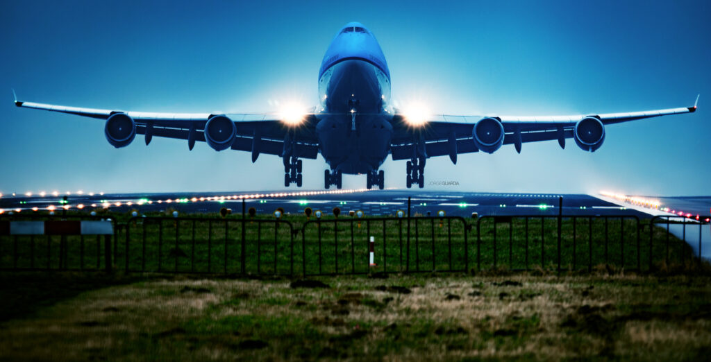 KLM Boeing B747-400 taking off at Amsterdam Schiphol during rain