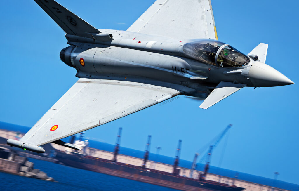 Spanish Air Force Eurofighter Typhoon from Ala 11 flying low over the sea at Gijon, Spain
