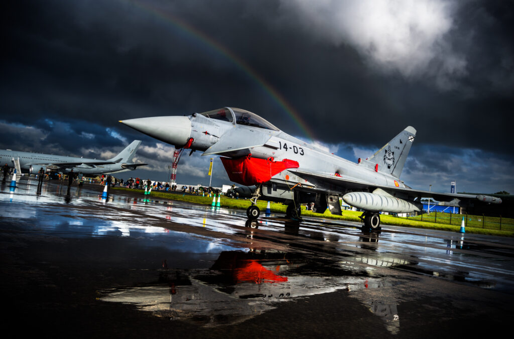 Spanish Air Force Eurofighter Typhoon from Ala 14 with a rainbow after a storm during RIAT airshow at Fairford