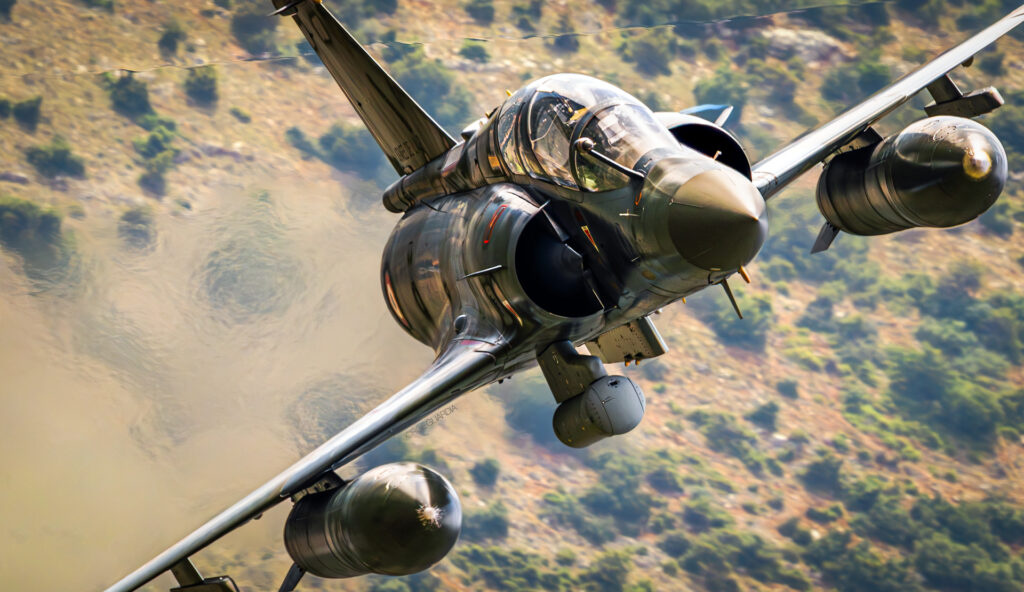 Dassault Mirage M2000 of the armée de l'air (French Air Force) flying low on Vouraikos Canyon