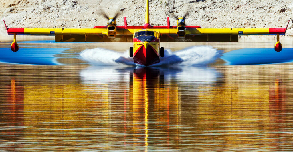 Spanish Air Force Canadair CL-415 from 43 Grupo seen from the front landing in the water near Madrid