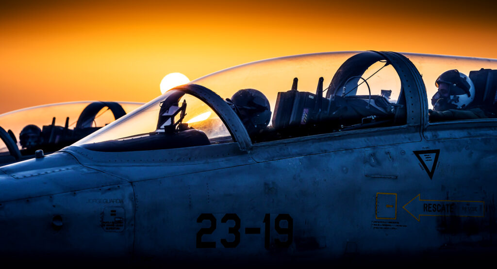 Two Spanish Air Force Northrop F-5 trainers from Ala 23 taxiing during sunset